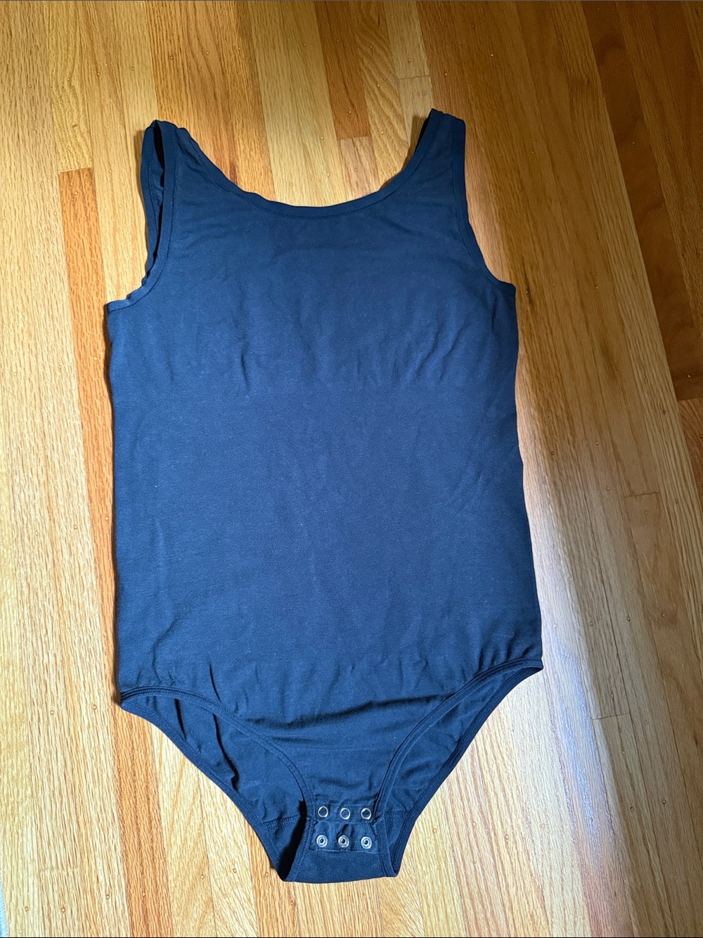 Black Sleeveless One-Piece Bodysuit with Light Compression